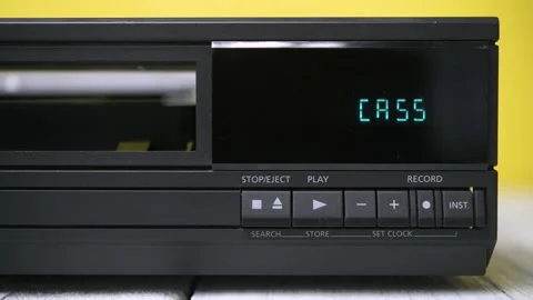 Removing a video cassette from a VCR. Stock Footage 183268056