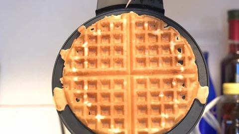 Removing Waffle from Iron Stock-Footage 123479464
