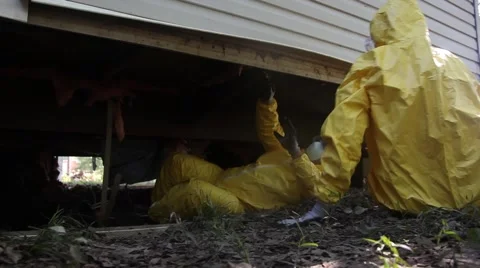 Removing Wet Insulation from Underneath Mobile Home After Flood - Dollying Shot 스톡 동영상 52995254