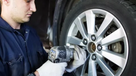 Removing Wheels With Auto Stock Footage 67461600