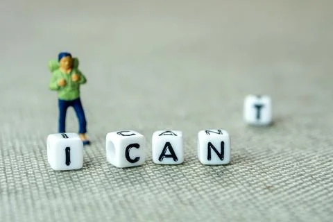Removing white cube with letter "t" from the word "i can't" creating new word Stock Photos