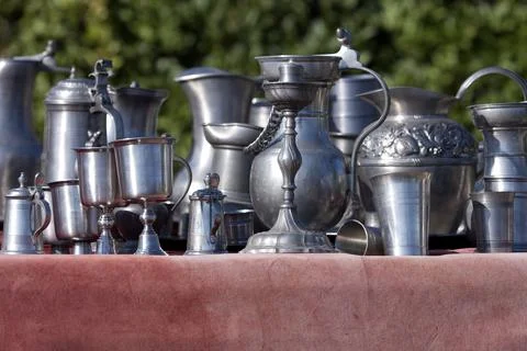 Renaissance silverware: flasks, cups, pots, ampoules in metal, silver or pewter. Stock Photos