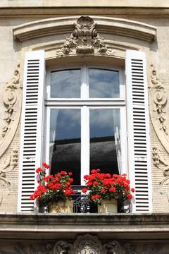 Renaissance window with flowers Stock Photos