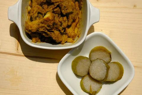 Rendang with lemang Stock Photos