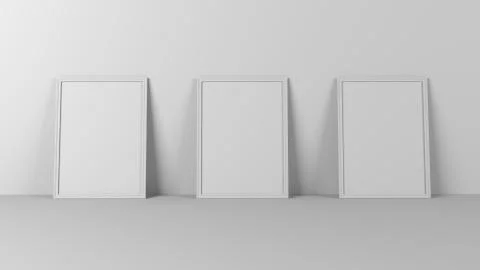 Render of 3D Blank Picture Frames on Empty Wall Stock Illustration