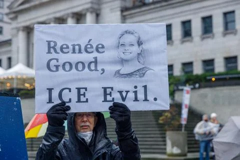 "Rene Good ICE Evil" protest sign with portrait held by demonstrator at Van.. Stock Photos