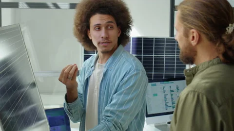 Renewable Energy Developer Telling about Solar Panel to Colleague Stock-Footage 230106141