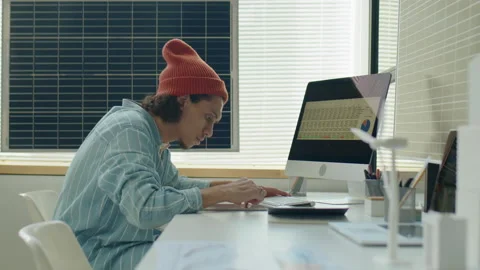 Renewable Energy Developer Using Computer in Office Video stock 230102910