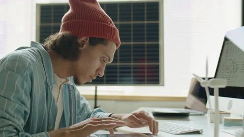 Renewable Energy Developer Working on Tablet and Computer Stock-Footage 230103240