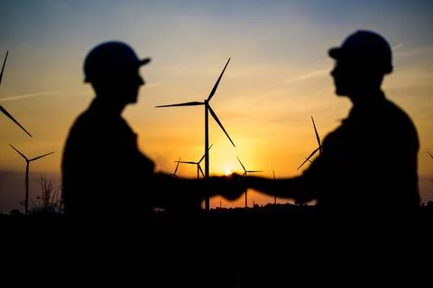 Renewable energy engineer working on wind turbine Stock Photos