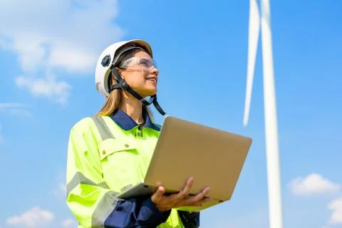 Renewable energy engineer working on wind turbine Stock-Fotos