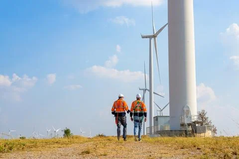 Renewable energy engineer working on wind turbine Stock Photos