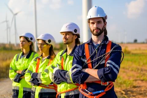 Renewable energy engineer working on wind turbine Stock Photos