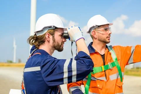 Renewable energy engineer working on wind turbine Stock Photos