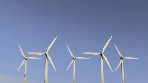 Renewable Energy Generation: Loopable Wind Turbine Farm Against Clear Sky Stock Footage 109259231