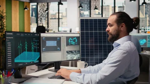 Renewable energy researcher using simulation software, improving green industry Stock Footage 316005593