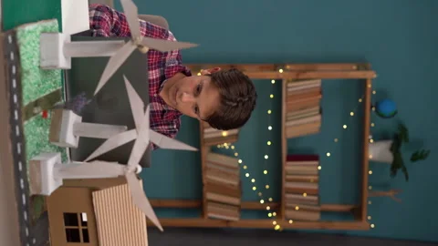 Renewable energy, science, and technology concept. Happy boy working with laptop Stock Footage 247640181