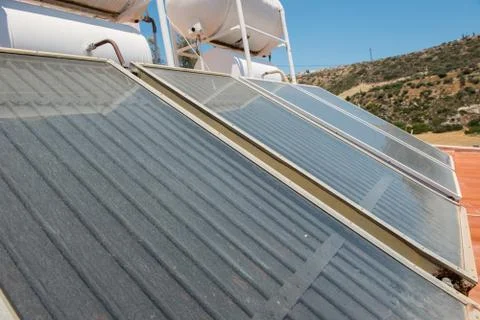 Renewable energy. Solar panel system for hot water Stock Photos