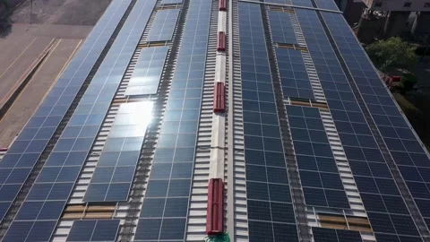 Renewable Energy Solar Panels On A Rooftop Powering A Chemical Industrial Plant Stock-Footage 345024968