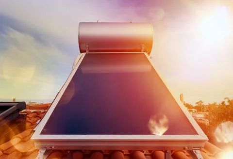 Renewable energy system with solar panel for hot water Stock Photos