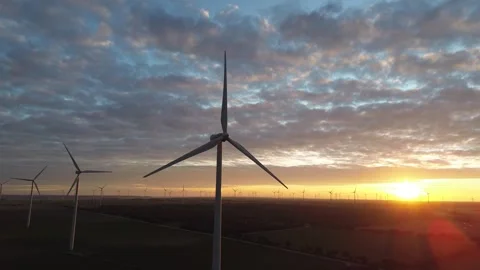 Renewable Energy Wind Farm During Golden Hour Stock Footage 325046136