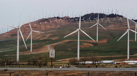 Renewable Energy Wind Turbines generating Power near Bakersfield Video stock 61143288