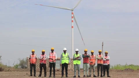 Renewable energy workforce standing together for a group portrait at an Stock Footage 337205620