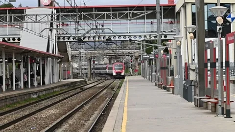 Renfe passenger train in motion at Collado Villalba station, 03/03/2026 Stock Footage 330053547