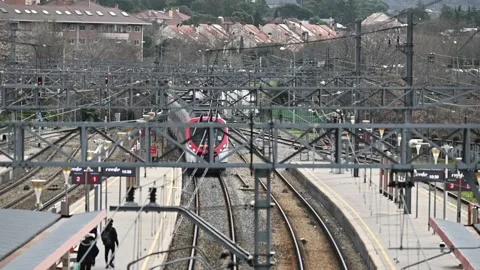 Renfe passenger train in motion at Collado Villalba station, 03/03/2026 Stock Footage 330053553