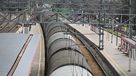 Renfe passenger train in motion at Collado Villalba station, 03/03/2026 Stock Footage 330059787