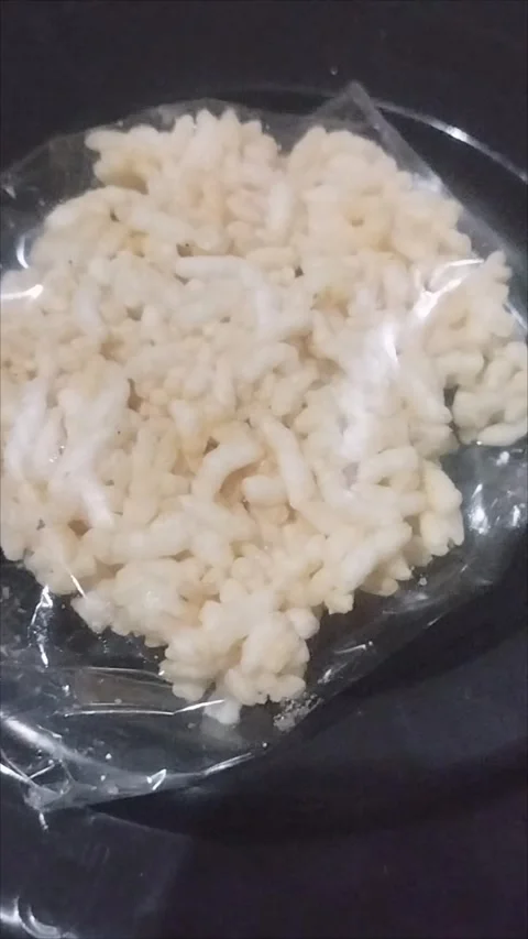 Rengginang Rice Cracker in Plastic Wrap – Simple Traditional Snack Scene Stock Footage 295973353