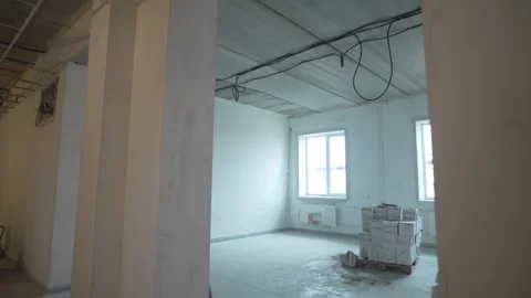 Renovated enclosure with grid carcass on ceiling and column Stock Footage 312405438
