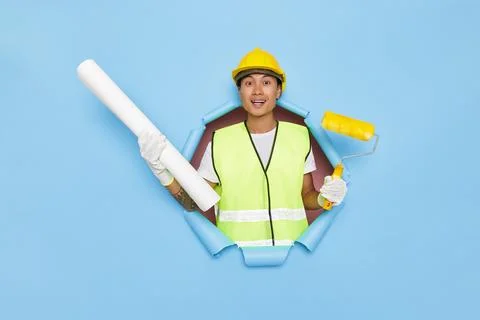 Renovation and occupation concept. Happy positive architect man in hardhat Stock Photos