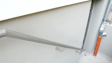 Renovation of a building - new railing Stockbeeldmateriaal 253214138