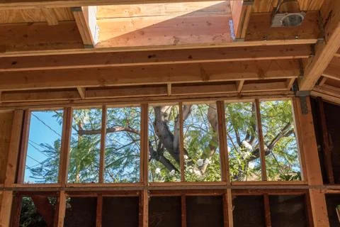 Renovation construction showing added stud wall to raise roof height Stock Photos