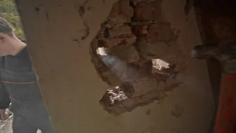 The Renovation Process in an Abandoned Building Emphasizing Intriguing Sunlight Stock Footage 313844664
