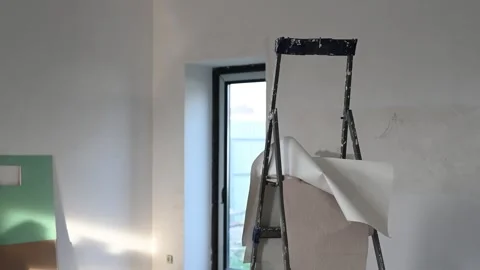 Renovation project: construction worker prepping wall for plastering Видео 305163856