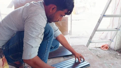 Renovation Worker Shapes Panel sitting in Shop Stock Footage 313277703