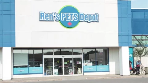 Rens pets depot front store entrance storefront facade with logo sign pillars Stock Footage 249758252