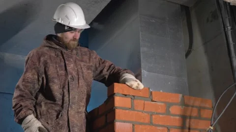 Repair and construction work. Clip. A young team working with cement and Stock Footage 236418911