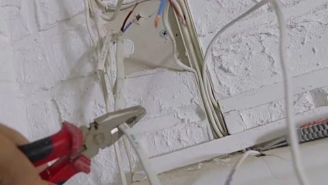 Repair and replacement of electrical cables in the house. Stock Footage 165445722