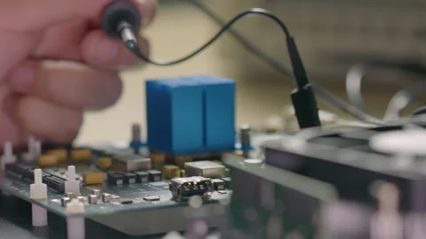 Repair and test high-end circuit boards Stock Footage 240904694