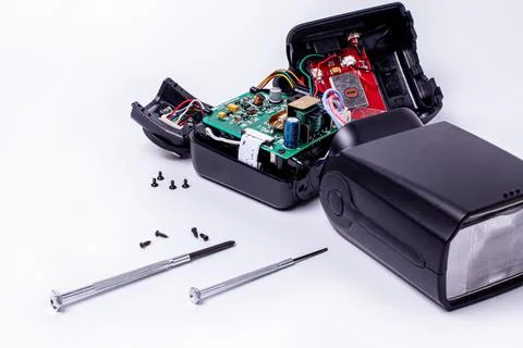 Repair of the camera's on-camera flash. camera service center. Stock Photos