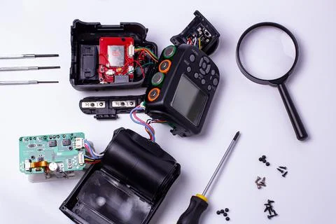 Repair of the camera's on-camera flash. camera service center. Stock Photos