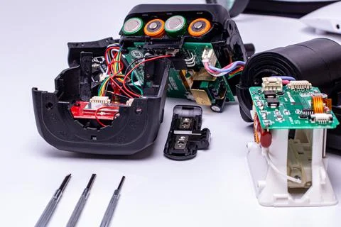 Repair of the camera's on-camera flash. camera service center. Stock Photos