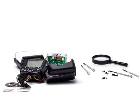 Repair of the camera's on-camera flash. camera service center. Stock Photos
