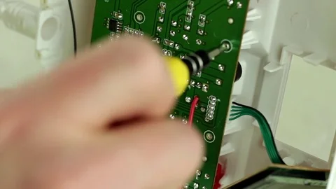 Repair of a chip of electronics Stock Footage 73044426