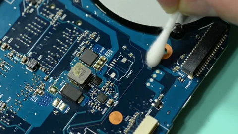 Repair computer circuit board: cleaning work space. Stock Footage 105341444