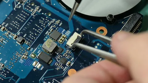 Repair computer circuit board: placing connector on the laptop motherboard. Stock Footage 105341588