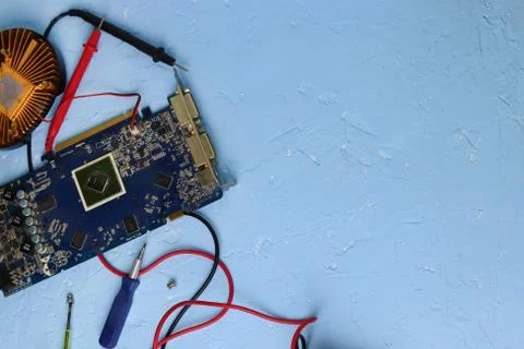 Repair an electronic device using Multimetr Stock Photos